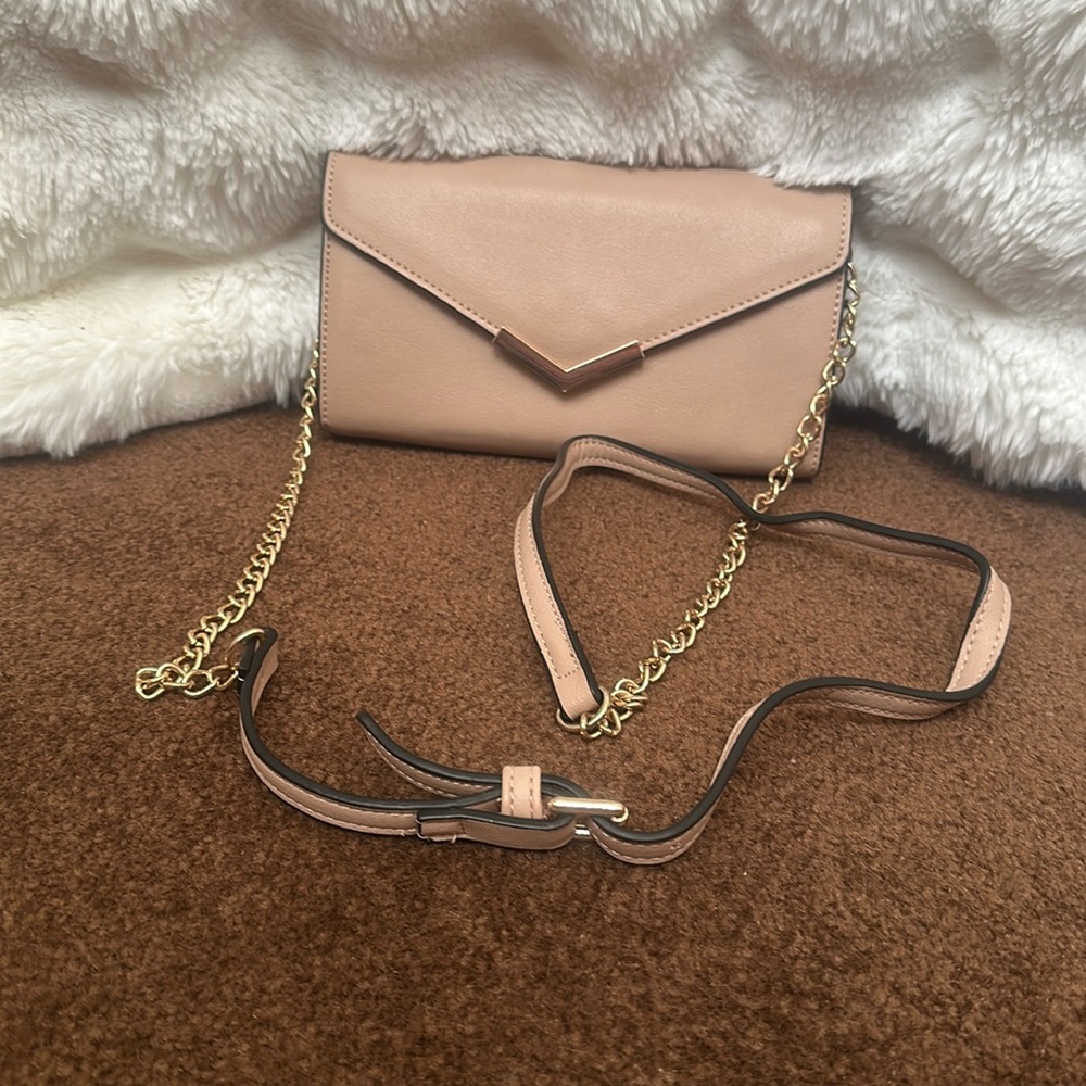 NWT..Urban Expression crossbody.  Has some markings from storing.